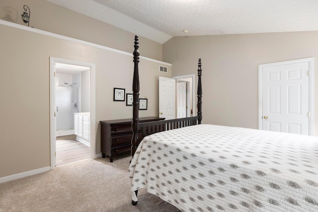 6258 Tetlin Field Dr, New Albany, OH 43054 - bedroom with light colored carpet, vaulted ceiling, ensuite bath, and a textured ceiling