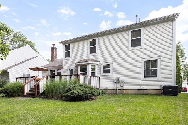6258 Tetlin Field Dr, New Albany, OH 43054 - back of house featuring a deck and a lawn