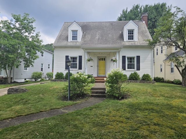 521 E Allen St, Lancaster, OH 43130 - cape cod-style house featuring a front lawn and a chimney