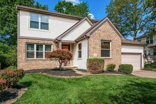 4224 Eagle Head Dr, Columbus, OH 43230 - view of front of home featuring brick siding, an attached garage, a front lawn, and driveway