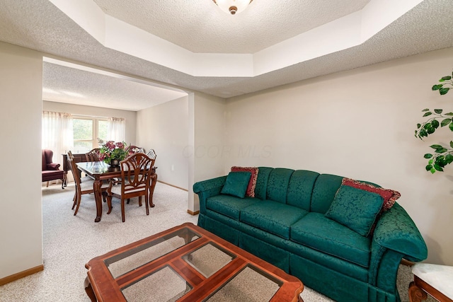 4224 Eagle Head Dr, Columbus, OH 43230 - carpeted living room with a textured ceiling and baseboards
