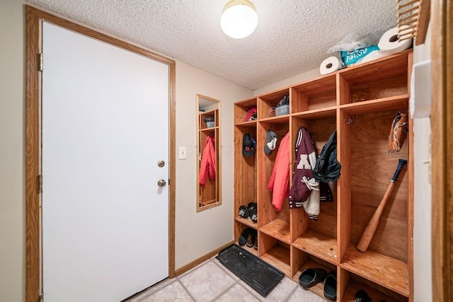 4224 Eagle Head Dr, Columbus, OH 43230 - mudroom with a textured ceiling