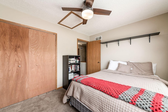 4224 Eagle Head Dr, Columbus, OH 43230 - bedroom with carpet, a closet, a textured ceiling, and ceiling fan