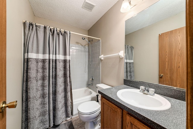 4224 Eagle Head Dr, Columbus, OH 43230 - bathroom featuring vanity, shower / tub combo, and a textured ceiling