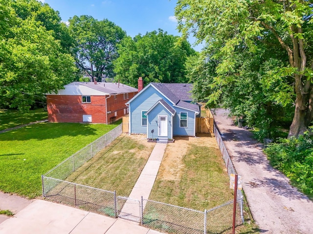 1612 Cole St, Columbus, OH 43205 - bungalow-style home with a gate, a chimney, and driveway