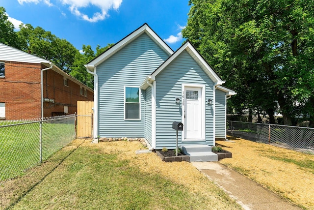 1612 Cole St, Columbus, OH 43205 - view of front of house with a fenced backyard