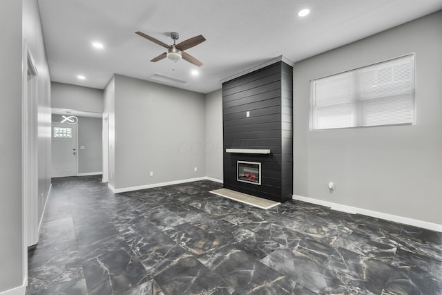 1612 Cole St, Columbus, OH 43205 - unfurnished living room featuring ceiling fan, recessed lighting, a large fireplace, and marble finish floors