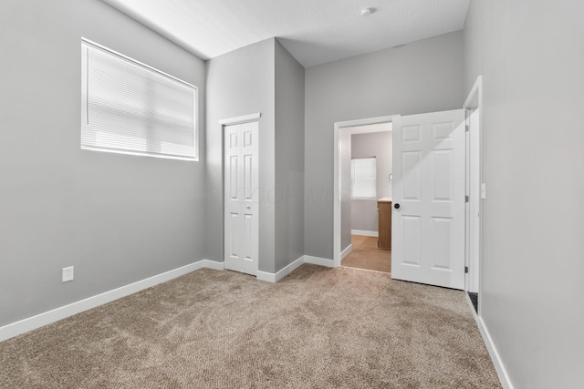 1612 Cole St, Columbus, OH 43205 - unfurnished bedroom with carpet floors and a closet