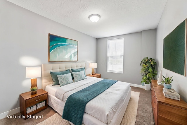 1612 Cole St, Columbus, OH 43205 - carpeted bedroom with baseboards and a textured ceiling