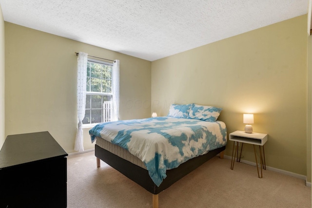 4109 Blendon Way Dr Unit 99E, Columbus, OH 43230 - bedroom with light carpet and a textured ceiling