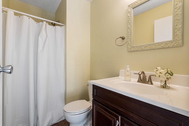 4109 Blendon Way Dr Unit 99E, Columbus, OH 43230 - bathroom with vanity, a textured ceiling, and curtained shower