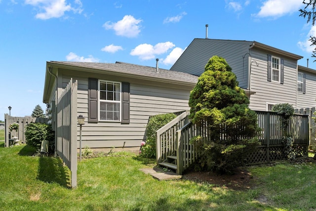 4109 Blendon Way Dr Unit 99E, Columbus, OH 43230 - back of property with a lawn and a deck