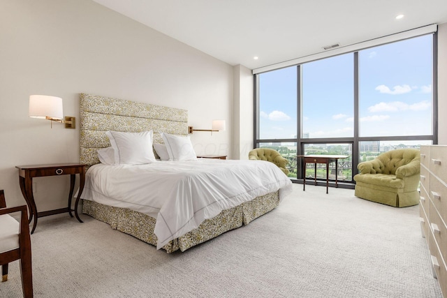 250 W Spring St Unit 626, Columbus, OH 43215 - carpeted bedroom with a wall of windows and recessed lighting