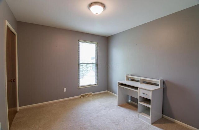 1206 Crescent Heights Rd, Marion, OH 43302 - unfurnished bedroom with light colored carpet