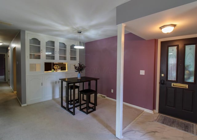 1206 Crescent Heights Rd, Marion, OH 43302 - foyer featuring baseboards and light colored carpet