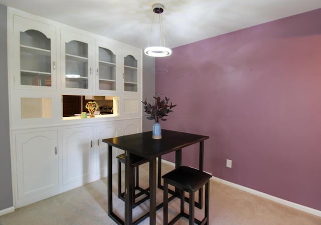 1206 Crescent Heights Rd, Marion, OH 43302 - dining space featuring light colored carpet and baseboards