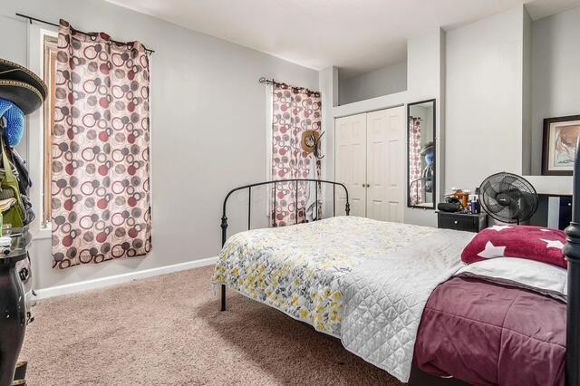 1364 E Fulton St, Columbus, OH 43205 - bedroom with carpet and a closet