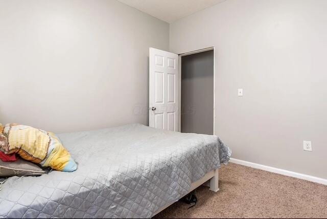 1364 E Fulton St, Columbus, OH 43205 - carpeted bedroom featuring baseboards