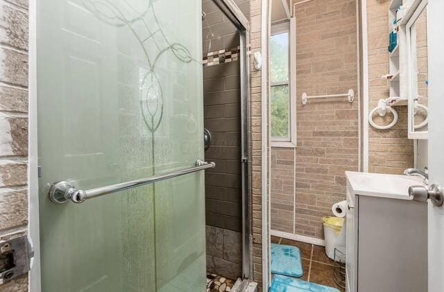 1364 E Fulton St, Columbus, OH 43205 - full bath with vanity, a stall shower, and tile patterned flooring