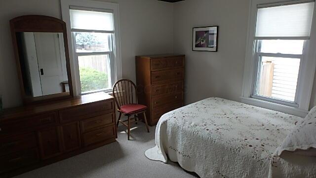 1483 Elmwood Ave, Columbus, OH 43212 - bedroom featuring light colored carpet