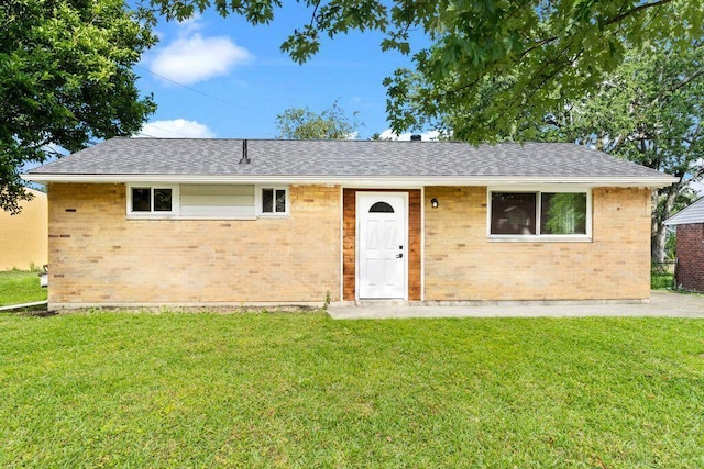 1556 Vilardo Ln, Columbus, OH 43227 - ranch-style house with a front yard, brick siding, and roof with shingles