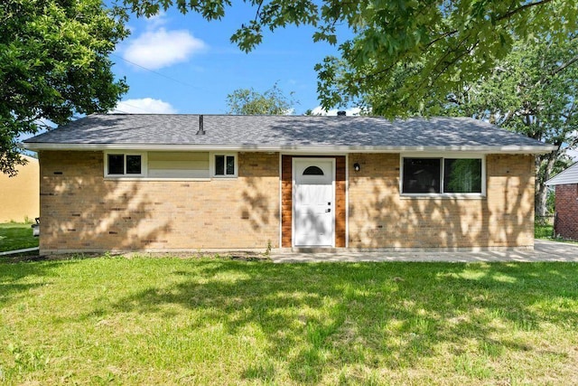 1556 Vilardo Ln, Columbus, OH 43227 - single story home with a front lawn, brick siding, and roof with shingles