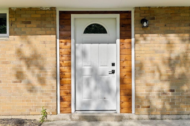 1556 Vilardo Ln, Columbus, OH 43227 - view of exterior entry featuring brick siding