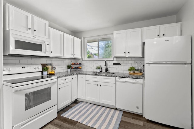 1556 Vilardo Ln, Columbus, OH 43227 - kitchen featuring white appliances, white cabinets, and tasteful backsplash