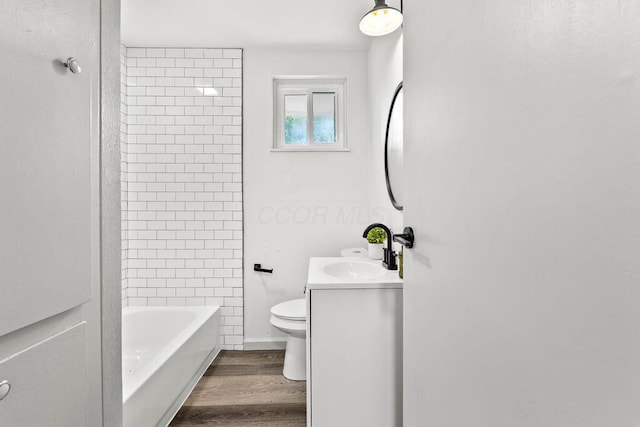 1556 Vilardo Ln, Columbus, OH 43227 - bathroom with vanity, wood finished floors, and shower / washtub combination