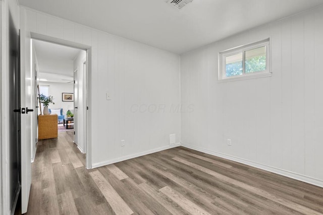 1556 Vilardo Ln, Columbus, OH 43227 - empty room with wood finished floors and plenty of natural light