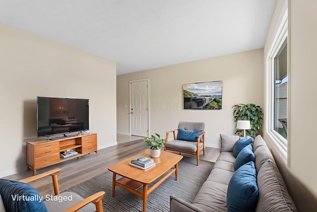 893 Aladdin Ct, Columbus, OH 43207 - living room featuring wood finished floors and baseboards