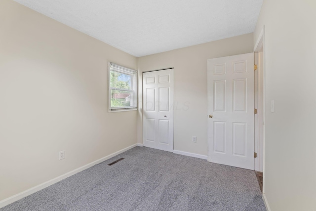 893 Aladdin Ct, Columbus, OH 43207 - unfurnished bedroom with carpet floors and a closet
