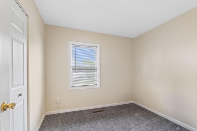 893 Aladdin Ct, Columbus, OH 43207 - carpeted empty room with baseboards