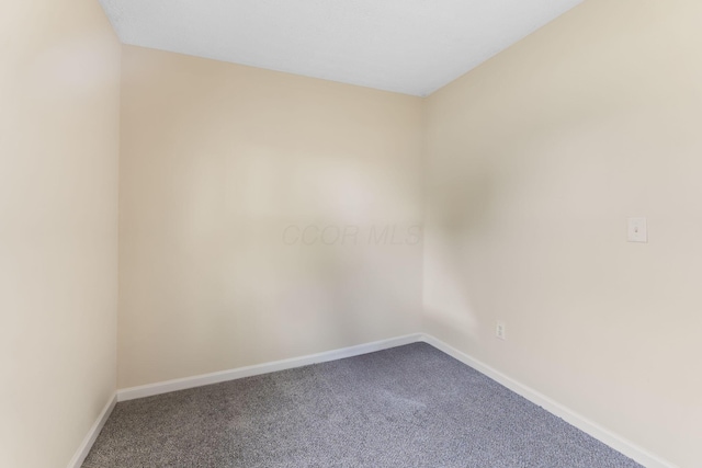 893 Aladdin Ct, Columbus, OH 43207 - empty room with carpet flooring and baseboards