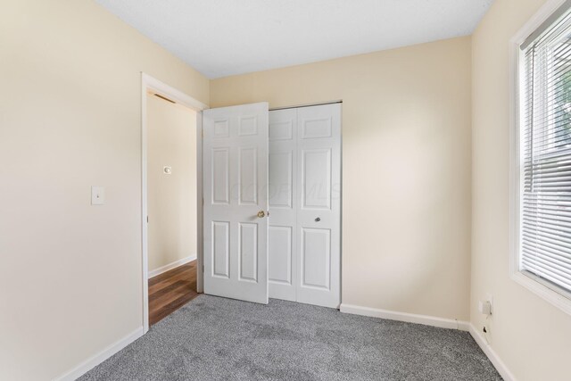 893 Aladdin Ct, Columbus, OH 43207 - unfurnished bedroom featuring carpet floors and a closet