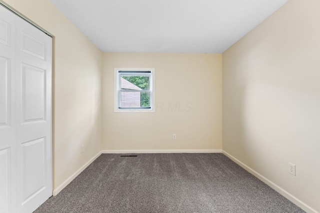 893 Aladdin Ct, Columbus, OH 43207 - carpeted empty room featuring baseboards
