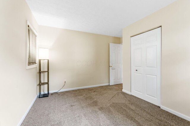 893 Aladdin Ct, Columbus, OH 43207 - unfurnished bedroom featuring carpet and a closet