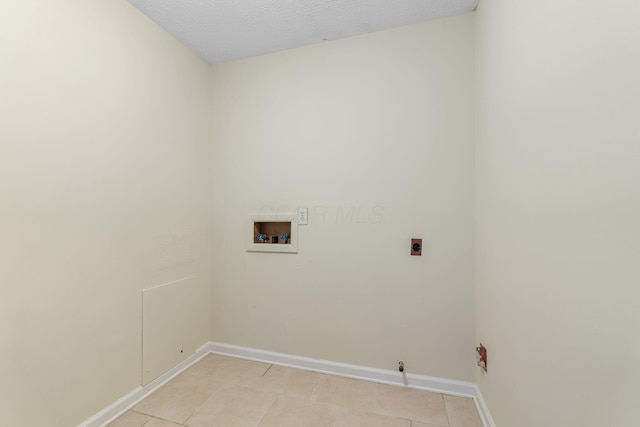 893 Aladdin Ct, Columbus, OH 43207 - laundry room with washer hookup, gas dryer hookup, and light tile patterned flooring
