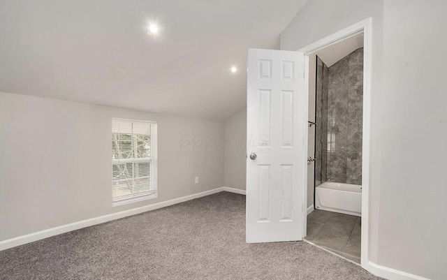 1555 Myrtle Ave, Columbus, OH 43211 - additional living space with vaulted ceiling and carpet floors