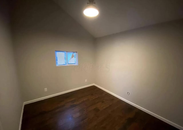 1555 Myrtle Ave, Columbus, OH 43211 - empty room with vaulted ceiling and dark wood-style floors