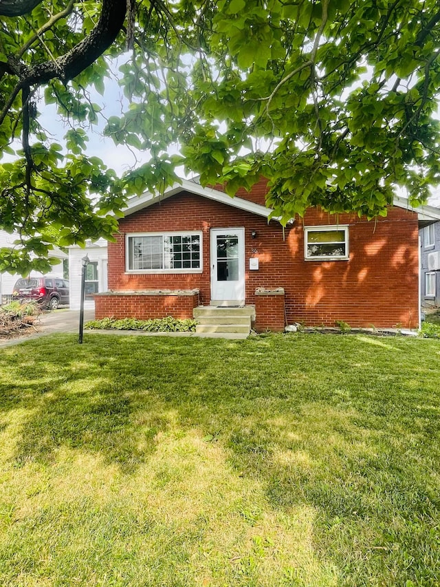 36 Hilliard Rome Rd, Columbus, OH 43228 - single story home featuring entry steps, brick siding, and a front yard