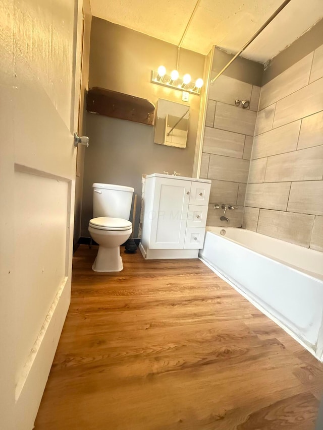 330 S Harris Ave, Columbus, OH 43204 - full bathroom featuring wood finished floors, bathtub / shower combination, and vanity