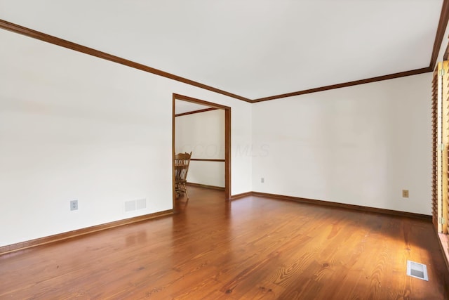 1100 Riva Ridge Blvd, Columbus, OH 43230 - empty room with wood finished floors and ornamental molding