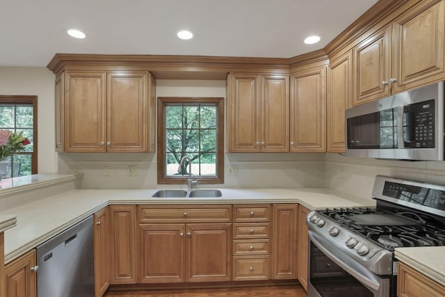 1100 Riva Ridge Blvd, Columbus, OH 43230 - kitchen with appliances with stainless steel finishes, healthy amount of natural light, recessed lighting, light countertops, and decorative backsplash