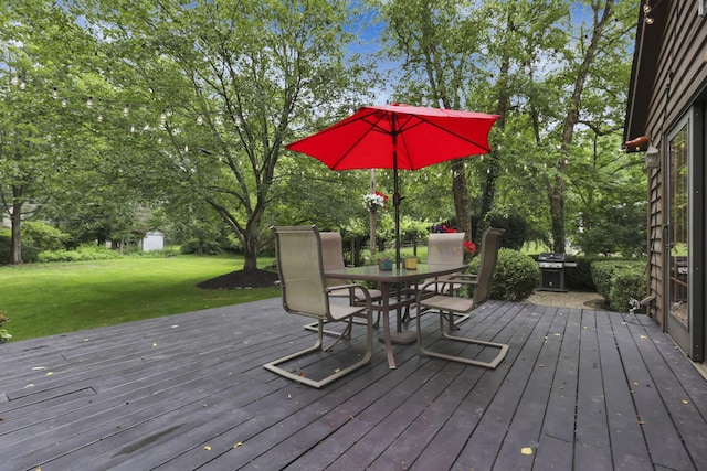 1100 Riva Ridge Blvd, Columbus, OH 43230 - wooden deck featuring outdoor dining space, a lawn, view of scattered trees, and a grill