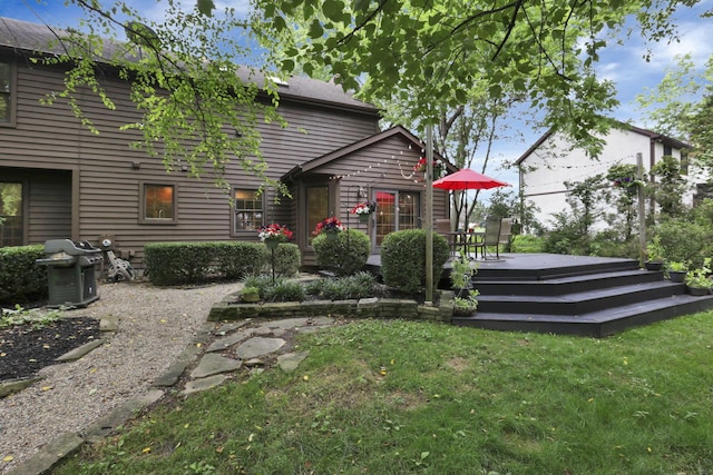 1100 Riva Ridge Blvd, Columbus, OH 43230 - rear view of house featuring a yard and a wooden deck