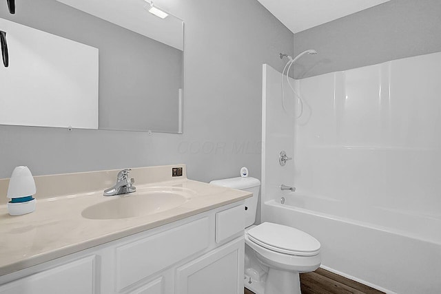 406 Aarika Dr, West Jefferson, OH 43162 - full bath featuring vanity, shower / washtub combination, and wood finished floors