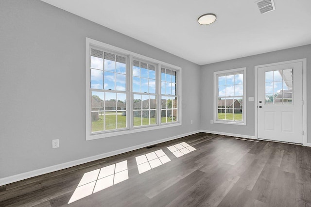 406 Aarika Dr, West Jefferson, OH 43162 - empty room with baseboards and dark wood finished floors