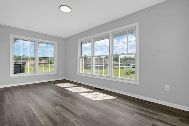 406 Aarika Dr, West Jefferson, OH 43162 - spare room with dark wood finished floors