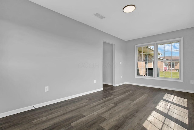 406 Aarika Dr, West Jefferson, OH 43162 - unfurnished room with dark wood finished floors and baseboards